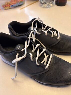 Nike women’s Black golf Shoes with White Laces and Gray Accents - like new